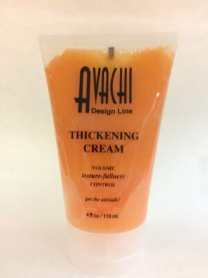 A plastic cup with orange juice and black writing.