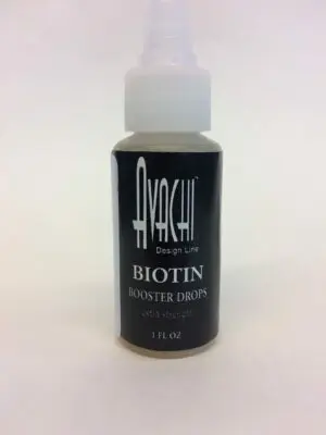 A bottle of biotin booster drops