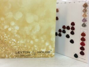 Two translucent panels with artistic dot patterns, one in warm yellow and the other in black and white.
