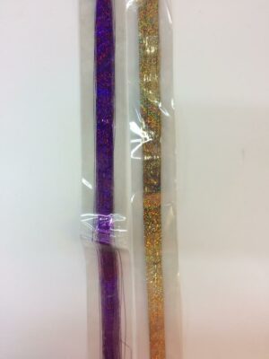 A pair of purple and gold pencils in plastic.