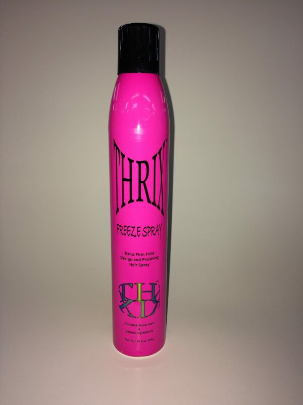 A pink spray can with the word " thrill " written on it.