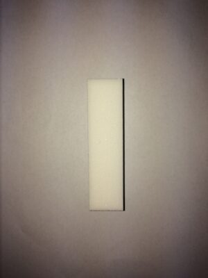 A white piece of paper on the wall.