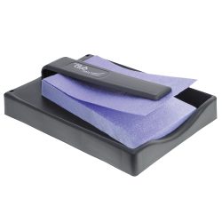 A black plastic tray with purple paper on top of it.