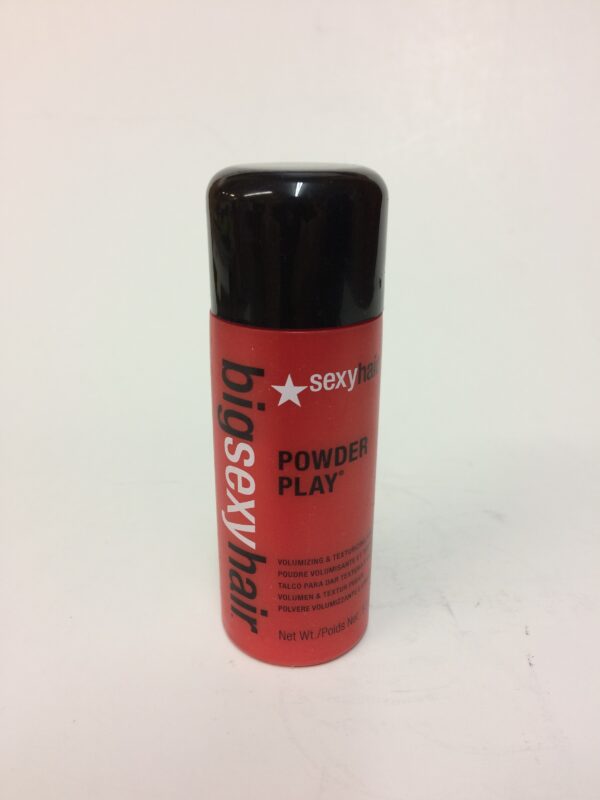 A red spray can of hair color.